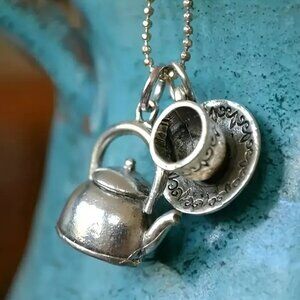 RETRO CUP AND SAUCER PENDANT ON EMBOSSED SILVER CHAIN